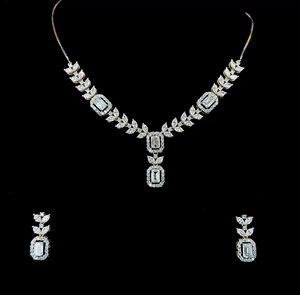 Ensemble collier et boucles d'oreilles de luxe en diamants taille émeraude avec motifs de feuilles marquises bicolores - Product Image 1