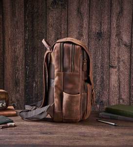 กระเป๋าเป้สะพายหลังกันน้ำสำหรับเดินทาง หนังแท้คุณภาพสูง สไตล์วินเทจ ป้องกันการโจรกรรม ความจุ 20-35 ลิตร เหมาะสำหรับทุกเพศ - Product Image 4