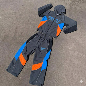 Conjunto Deportivo Reflectante para Hombre Rexfit 2026, Chaqueta Cortavientos y Pantalones Jogger de 2 Piezas, Material de Nailon, Marca Privada - Product Image 1