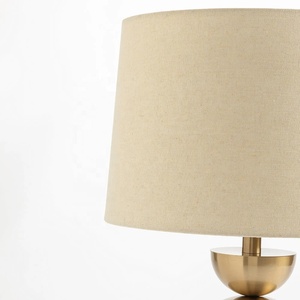 Lampe de table en métal Auric Capsule avec abat-jour en lin naturel, finition laiton brossé, lumière ambiante douce pour les espaces élégants - Product Image 6