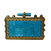 Pochette à panneaux en pierre de turquoise, pierres incrustées à la main, cadre doré orné, fabrication artisanale, luxe, écologique, chaînes, mode