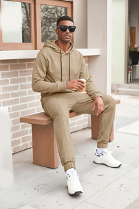 Fabricante al por mayor de chándales de forro polar con logotipo personalizado, proveedor de sudaderas con capucha y pantalones de chándal gruesos sin estampado. - Product Image 5