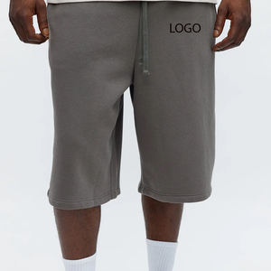 Pantalones cortos de color sólido para hombre con diseño de logotipo personalizado y ajuste cómodo, cintura elástica, diseño moderno y material transpirable a precio económico. - Product Image 1