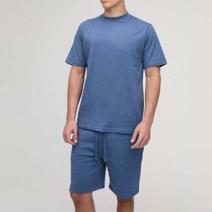 ชุดเซ็ตเสื้อยืดแขนสั้นและกางเกงขาสั้นผ้าฝ้ายสำหรับผู้ชาย 2 ชิ้น สไตล์ลำลอง สีพื้น น้ำหนักเบา เหมาะสำหรับใส่เที่ยวเล่น - Product Image 4