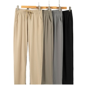 Pantalones deportivos informales de secado rápido con diseño de logotipo personalizado OEM para hombre, pantalones deportivos informales con cordón de cintura alta - Product Image 1