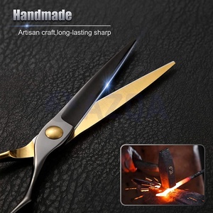 Tijeras Profesionales de Peluquería de Acero Inoxidable Negro y Dorado con Tornillo Ajustable y Reposa Dedos para Estilismo en Salón - Product Image 4