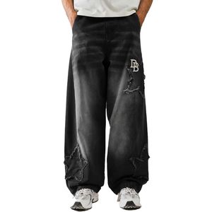 Jean baggy noir délavé surdimensionné pour homme, coupe large, en denim déchiré avec patch brodé blanc, style streetwear - Product Image 1
