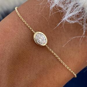 Bracelet populaire en argent sterling 925 plaqué or avec diamant de laboratoire taille émeraude serti clos pour femme - Product Image 5