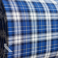 Tela de sarga 100% algodón teñida en hilo con estampado a cuadros, estilo franela, nueva moda 2026, directa de fábrica, para camisas y faldas de niño.