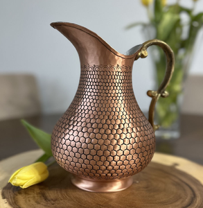 Polished <b>copper</b> carafe with a textured body design, matching lid, and ornate golden <b>handle</b>, available at wholesale price. - Product Image 4