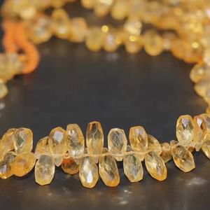 Excelentes cuentas de piedra con forma de gota facetada citrino de 5x9mm - Product Image 1