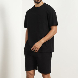 T-shirt à col rond noir pour homme avec poches latérales, décontracté, respirant, 100% coton, coupe ample, manches courtes, idéal pour l'été - Product Image 3