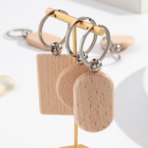 Llaveros DIY creativos y sencillos, dijes geométricos redondos y cuadrados de madera pintables, colgantes para mochilas infantiles, 10 unidades - Product Image 1