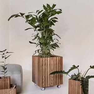 Jardinière surélevée en bois carbonisé avec pieds, fabriquée par un fabricant fiable, pour la culture de légumes et d'herbes dans les patios extérieurs et les jardins. - Product Image 4