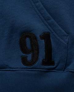 เสื้อฮู้ดซิปผู้ชายสีน้ำเงินกรมท่า ปักลายตัวอักษร E ทรงปกติ สไตล์พรีปปี้ ผ้าฝ้าย 100% เฟรนช์เทอร์รี่ - Product Image 4