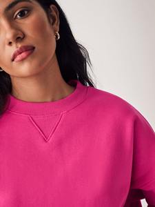 Premium oversized sweatshirt with heavyweight cotton, ribbed cuffs, and a relaxed fit for a modern streetwear look. - Product Image 2