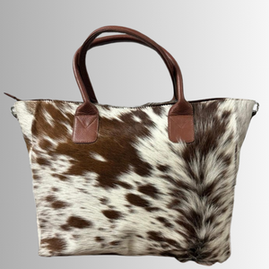 Bolsos de cuero de vaca hechos a mano, bolsos tote con pelo, proveedor mayorista OEM, moda premium personalizada para mujer a bajo precio - Product Image 1