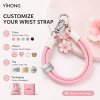 Vente en gros usine, populaire à l'international : Lanière de téléphone portable Hello Kitty, pendentif de sac court, sangle de poignet tressée à double clip