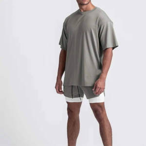 เสื้อยืดโอเวอร์ไซส์ผู้ชายรุ่นใหม่ปี 2026 ผ้าฝ้าย 100% ระบายอากาศได้ดี เป็นมิตรกับสิ่งแวดล้อม แขนสั้น คอกลม สีพื้น แห้งเร็ว มีหลายขนาด - Product Image 4
