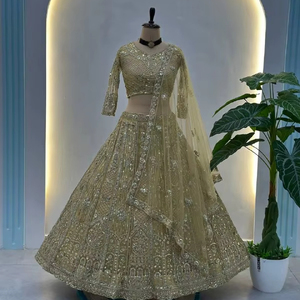 Ramdev Trading Women's Lehenga Choli Intricate Embroidery Traditional <b>Net</b> <b>Fabric</b> Recycled Materials Rich Hues Timeless Party - Product Image 1