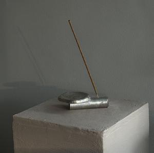 Minimal angled <b>incense</b> <b>holder</b> with low profile metal body designed to support long <b>incense</b> <b>sticks</b> cleanly ideal <b>for</b> modern best - Product Image 1