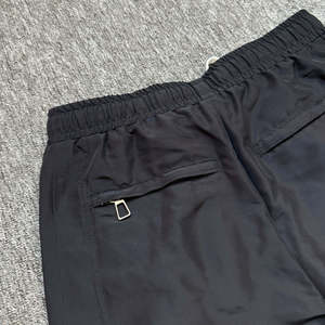 Pantalon de survêtement large pour homme avec fermeture éclair latérale, coupe ample, style hip-hop streetwear, en nylon, pour l'entraînement - Product Image 5