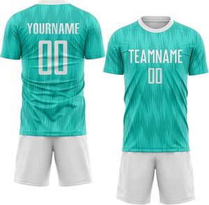 เสื้อฟุตบอลแบบกำหนดเองได้ ยูนิเซ็กซ์ สีเขียวอมฟ้า ขาว พิมพ์ลายแบบ Sublimation แขนสั้น คอกลม ระบายเหงื่อได้ดี เป็นมิตรกับสิ่งแวดล้อม ทรงปกติ - Product Image 1