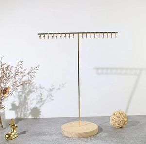 Expositor de joyería con diseño de rama de árbol floral dorada, con motivos florales ornamentados y base de bandeja redonda, disponible a precios de mayorista. - Product Image 6