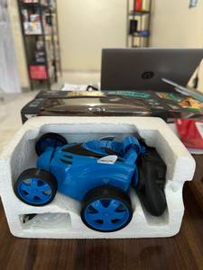 Auto de Carreras RC 4x4 Azul, Escala 1:24, Control Remoto de 4 Canales, Rotación de 360 Grados, Volteo, Retorno Automático, Motor Eléctrico, Interior/Exterior - Product Image 1