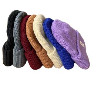 Gorro de invierno tejido de Jacquard de proveedor al por mayor gorro de moda con patrón de lazos bordados personalizados para escena de playa - Product Image 6