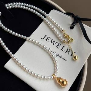 สร้อยคอผู้หญิงระดับไฮเอนด์ บาโอหู ดีไซน์เก๋ไก๋ ด้วยด้ายสีทอง ประดับจี้รูปน้ำเต้า หมุนได้ พร้อมไข่มุกใหม่ ดีไซน์หรูหรา - Product Image 5