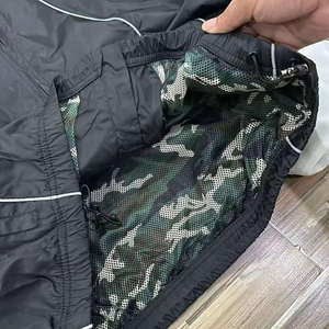 Conjunto de Chaqueta y Pantalón Deportivo de Invierno con Logotipo Personalizado Reflectante, Chaqueta Cortavientos con Cierre y Pantalón Recto de Poliéster para Hombre - Product Image 2