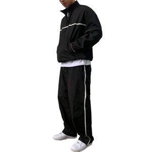 Conjunto unisex retro de cortavientos con bloques de color, chaqueta con cremallera y pantalones de pierna ancha, conjunto de dos piezas de ropa deportiva urbana de moda. - Product Image 3