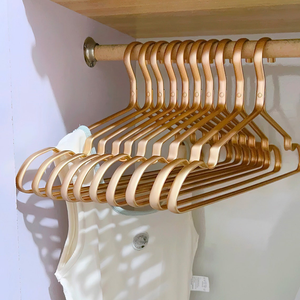 Cintres en métal or rose antidérapants, robustes, pour vêtements, cintres fins et peu encombrants pour chemises, robes, manteaux, placard - Product Image 1