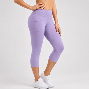Leggings de yoga capri personnalisés pour femmes, taille haute, extensibles dans 4 directions, poches latérales, séchage rapide, respirants, polyester/nylon, OEM - Product Image 1