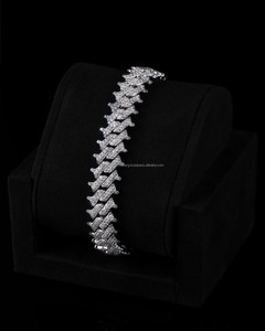 This luxury moissanite <b>bracelet</b> features a bold fully iced design with unique fishbone <b>inspired</b> links - Product Image 4