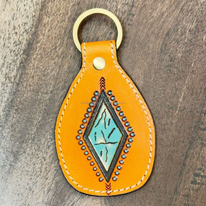 OEM ODM พวงกุญแจหนังวัวเป็นเครื่องมือทำมือทรงเพชรพวงกุญแจหนังแท้สำหรับผู้ชายและผู้หญิงอุปกรณ์ของขวัญที่ดีที่สุด - Product Image 4