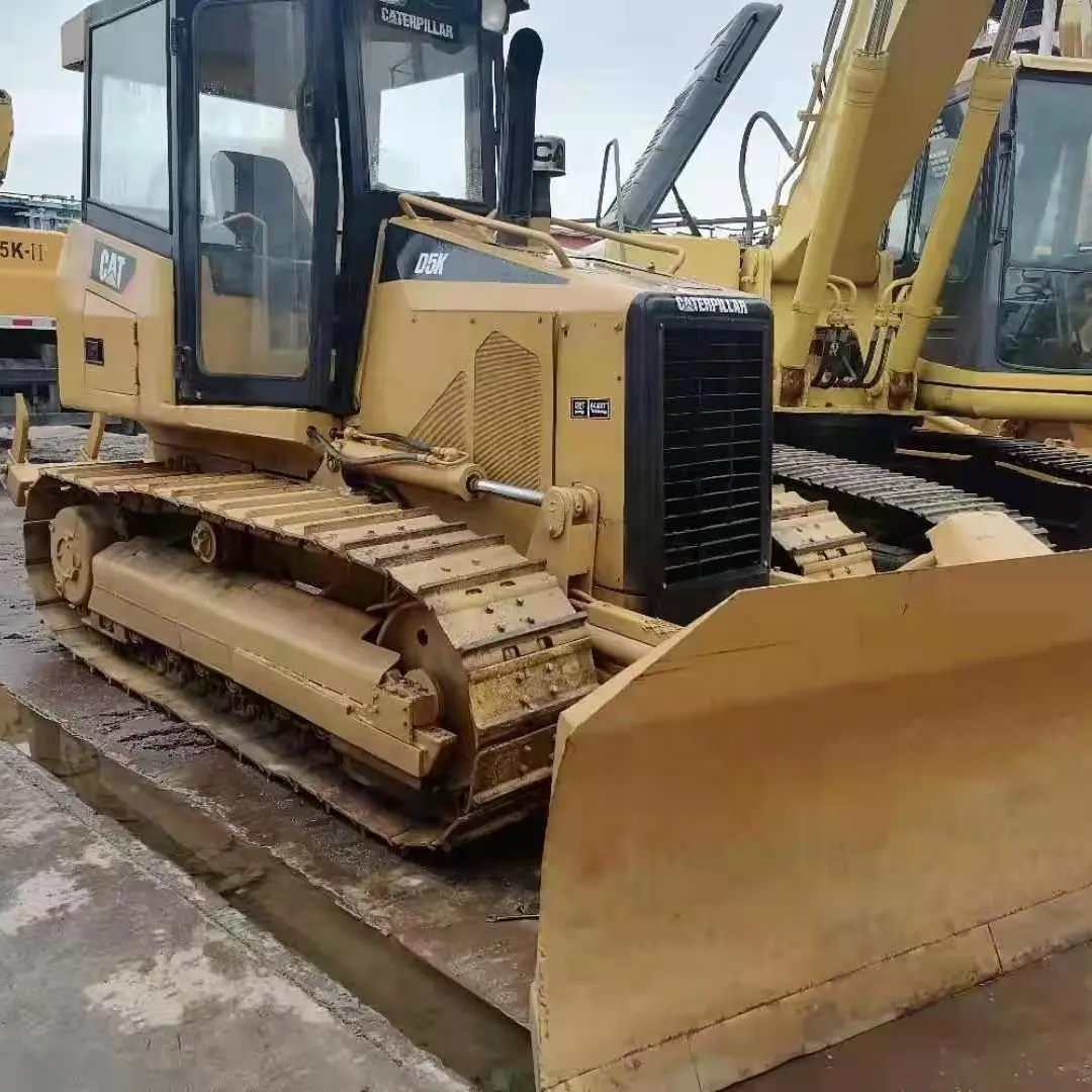 ใช้ CAT D5K Dozer สำหรับขายรถตีนตะขาบตีนตะขาบตีนตะขาบตีนตะขาบรถปราบดิน D5k มือสอง