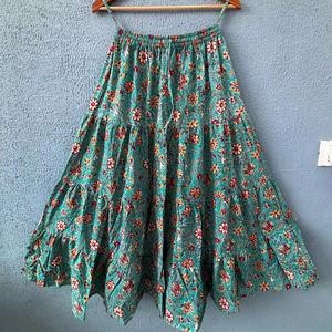 Embrace effortless bohemian charm with this teal <b>floral</b> tiered <b>long</b> <b>skirt</b> Crafted from soft breathable fabric - Product Image 1