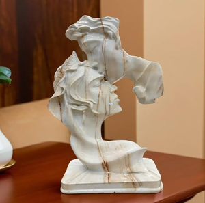 Abstract marble sculpture depicting an artistic romantic <b>couple</b> kiss with rich veining, available at wholesale prices. - Product Image 1