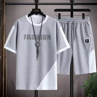 Ensemble de sport décontracté pour homme en polyester gaufré respirant, imprimé OEM, grande taille, col ample, t-shirt à manches courtes et short, idéal pour l'été