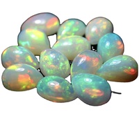 Vente en gros d'opale welo éthiopienne naturelle de qualité AAAA 4x6mm plus grand cabochon taille multi feu jouer en forme de poire chaleur pierres précieuses en vrac