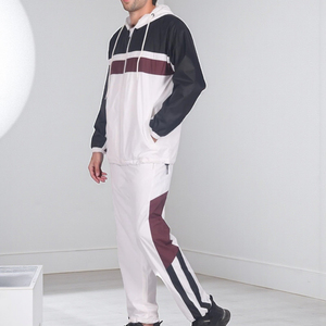 Ensemble de sport 2 pièces pour homme, imperméable et respirant, avec capuche, haut à manches longues zippé et pantalon, idéal pour l'hiver (Marque Blanche) - Product Image 1