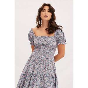 ชุดเดรสมิดิพิมพ์ลายดอกไม้สำหรับผู้หญิงแขนสั้นโบโฮชุดลำลองชายหาดฤดูร้อน - Product Image 2