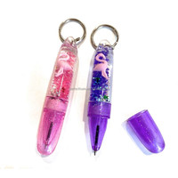 Stylo à bille flottant à flamant rose rempli de liquide, porte-clés, 0,5 mm, article promotionnel en plastique