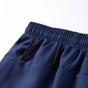 Pantalones cortos deportivos de doble capa 2 en 1 para hombre, con bolsillo interior para teléfono y diseño con presilla para toalla - Product Image 4