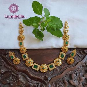 Rhodium Plated Fine Bridal Jewelry Set Leaf Shape Earrings with Ruby Embellished Matte Neckset - Product Image 1