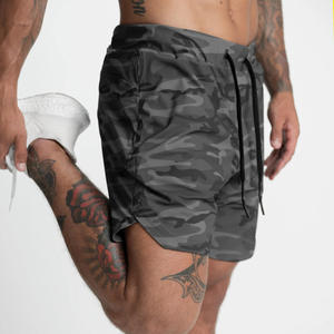 Shorts pour hommes en camouflage avec cordon de serrage, séchage rapide, avec poches, taille mi-haute, style décontracté, en polyester tissé - Product Image 1