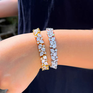 AMBER JEWELS Pulsera de tenis unisex de lujo chapada en oro de 10K con cristales de circonita de corte brillante y engaste de garra, diseño de cadena de flor - Product Image 2