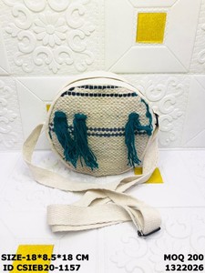 Handmade Cotton <b>Round</b> Sling Bag with Tassels | Boho Woven Crossbody Bag for Women - Product Image 1